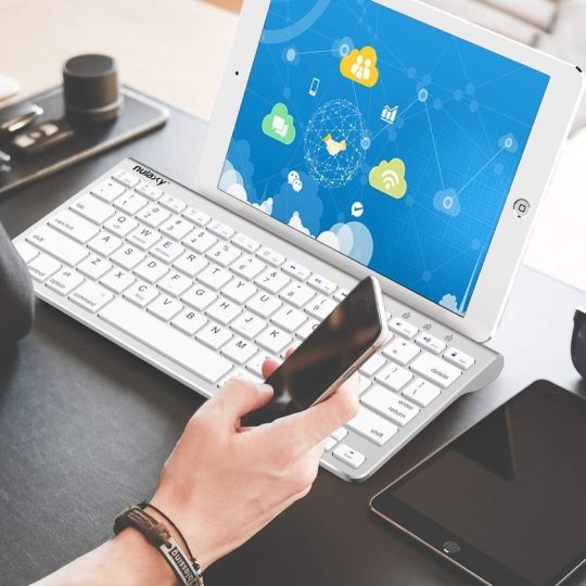 Full-size Bluetooth keyboard with sliding stand - best for writing on the iPad