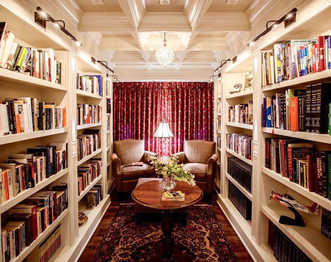 Traditional white burgundy family library design
