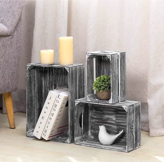 Vintage wooden crates as bookshelves - reading nook furniture